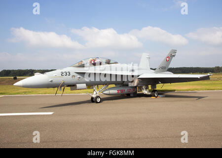 Swiss Air Force F/A-18 Hornet on the taxiway of Kleine Brogel airbase. Stock Photo
