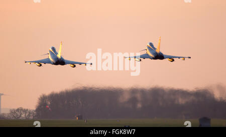 NORVENICH, GERMANY: DEC 14, 2015: Two German Air Force Eurofighter Typhoon fighters from Tactical Wing 31 flyby over the runway Stock Photo