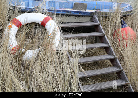 Empty fishing boat in the dunes in Texel Stock Photo