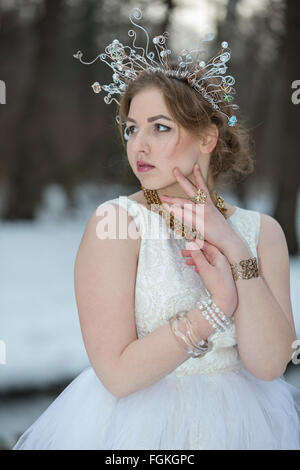 Portrait of a young beautiful woman wearing a Crown Stock Photo
