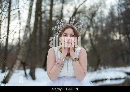 Portrait of a young beautiful woman wearing a Crown Stock Photo