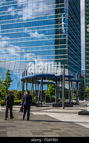 An executives walking in the entrance of a Tower, Madrid city, Spain Stock Photo