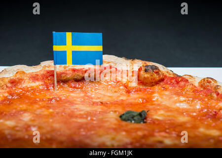 margherita pizza with tomato sauce and basil oil cooked in a wood oven original Italian Stock Photo