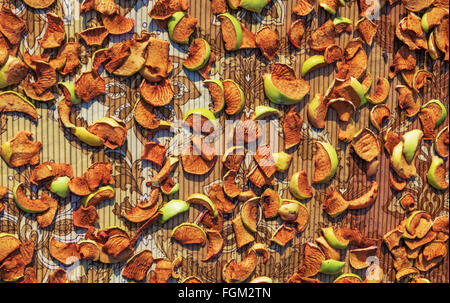 Background of dried slices apples, group of dry slices of apple. Stock Photo
