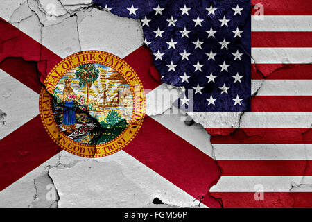 flags of Florida and USA painted on cracked wall Stock Photo