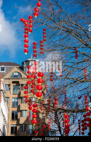 Red lanterns decorate the trees in Manchester City Centre to celebrate Chinese New Year Stock Photo