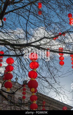 Red lanterns decorate the trees in Manchester City Centre to celebrate Chinese New Year Stock Photo
