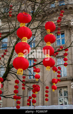 Red lanterns decorate the trees in Manchester City Centre to celebrate Chinese New Year Stock Photo