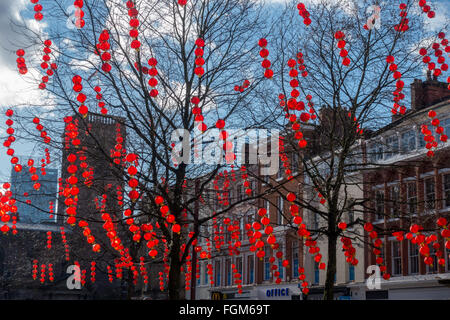 Red lanterns decorate the trees in Manchester City Centre to celebrate Chinese New Year Stock Photo