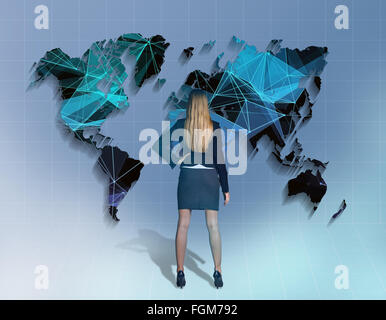 Girl stands in front of the network world map Stock Photo