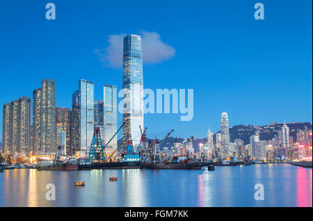 International Commerce Centre (ICC) and Yau Ma Tei Typhoon Shelter at dusk, West Kowloon, Hong Kong, China Stock Photo