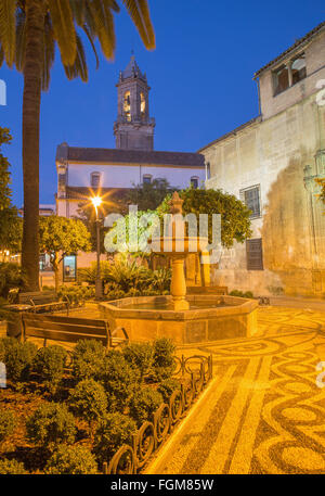 CORDOBA, SPAIN - MAY 26, 2015: The Plaza de San Andres square with the little fountain at dusk. Stock Photo