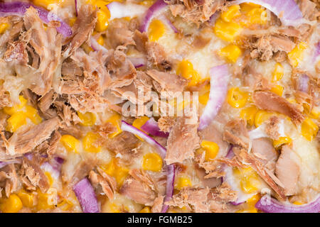 Fresh made Tuna Pizza close-up shot for use as background or as texture Stock Photo