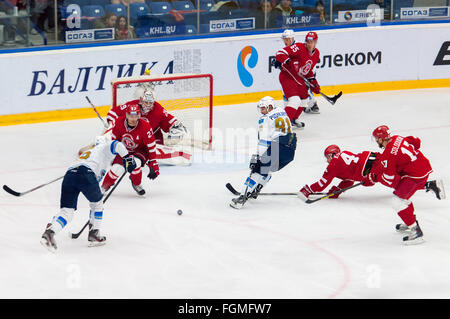 MOSCOW - OCTOBER 17, 2015: K. Pushkaryov (81) fall on T. Eronen (29) Barys on Russia KHL championship on October 17, 2015, in Moscow, Russia. Vityaz won 4:3 Stock Photo