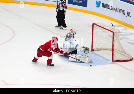 MOSCOW - OCTOBER 17, 2015: D. Shitikov (23) vs A. Ivanov (28) on hockey game Vityaz vs Barys on Russia KHL championship on October 17, 2015, in Moscow, Russia. Vityaz won 4:3 Stock Photo