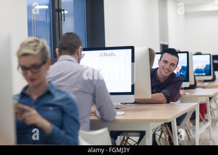 startup business, software developer working on desktop computer at ...