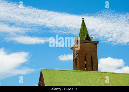 Christian church tower with clouds and blue sky in Madagascar Stock Photo