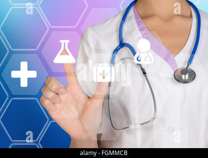 The doctor presses on a digital screen with icons medicine Stock Photo