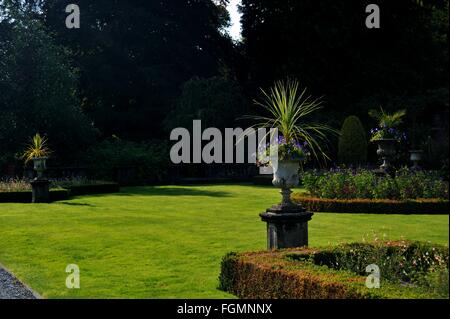 Rydal Hall, Rydal Village, Ambleside, Lake District National Park, Cumbria, England, UK. Formal gardens, Lawns, Garden Urns, Stock Photo