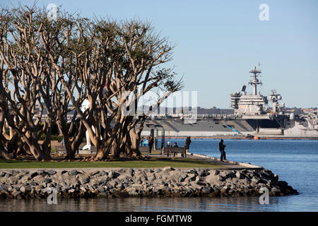 Tuna Harbor Park with USS Theodore Roosevelt in the background, San Diego, California Stock Photo