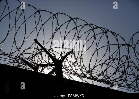 razor wire fence on the US Mexico border, Otay Mesa, California Stock Photo