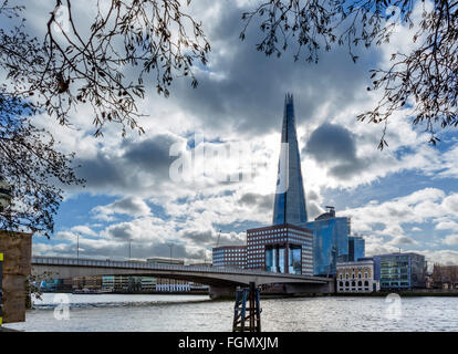 View over River Thames to London Bridge with The Shard behind, Southwark, London, England, UK Stock Photo