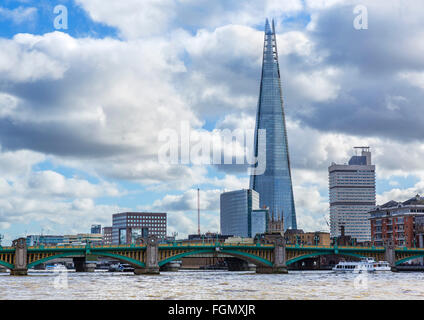 View over River Thames to Southwark Bridge with The Shard behind, Southwark, London, England, UK Stock Photo