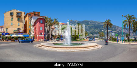 Roundabout with fountain in Menton - small town situated on French Riviera. Stock Photo