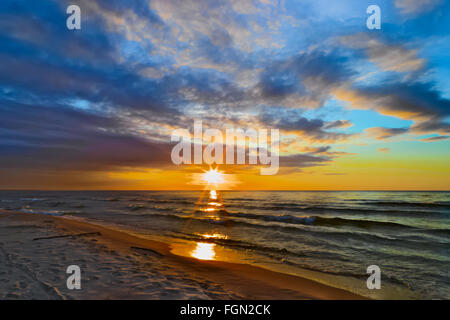 Seascape with mystical sunset and stunning cloud formations over the Gdansk Bay. Baltic sea, Pomerania, northern Poland. Stock Photo