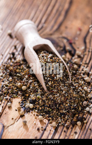 Wooden spoon with crushed Peppercorns (detailed close-up shot) Stock Photo