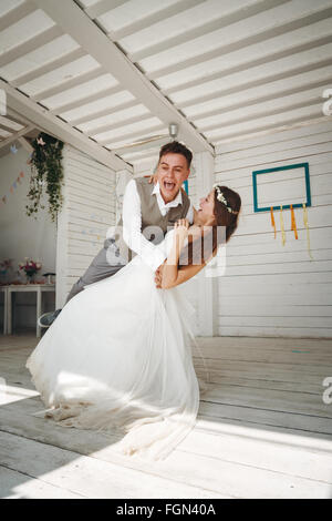 Emotional Moment of Wedding Dance. Beautiful Newlywed Couple. Stock Photo