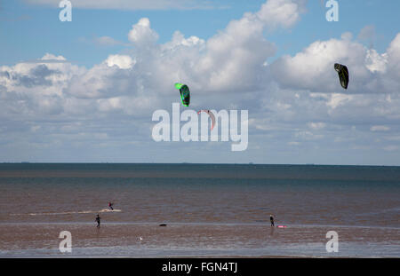 Kitesurfing or Kiteboarding at the beach At Hunstanton on a blustery day North Norfolk Coast Norfolk England Stock Photo