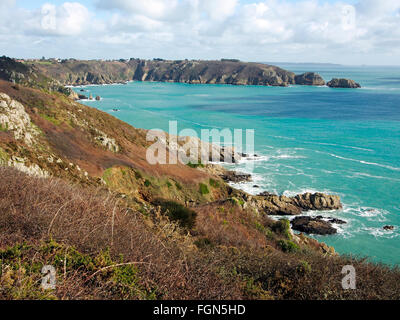 Moulin Huet Bay on the southern coast of Guernsey seen from Icart Point and looking east towards Jerbourg Point. Stock Photo