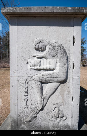 One of the many bas relief art pieces rescued from historic Toronto buildings on the grounds of the Guild Inn in Ontario Canada Stock Photo