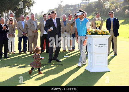 California, USA. 21st February, 2016. February 21, 2016 Bubba Watson picks up his daughter after she ran onto the green after winning the Northern Trust Open at Riviera Country Club in Pacific Palisades, California. Credit:  Cal Sport Media/Alamy Live News Stock Photo