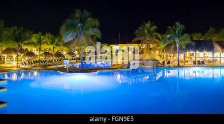 Panorama of hotel and swimming pool at night, Stock Photo