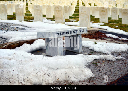 Marble bench in Military Cemetery honoring military heroes who have died Stock Photo