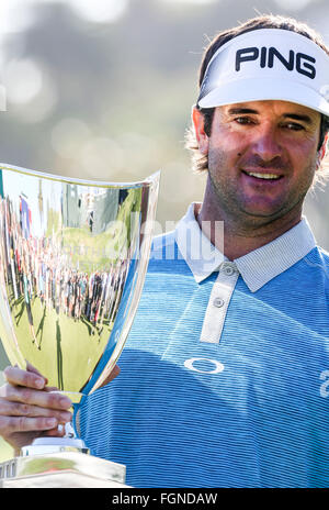 Los Angeles, California, USA. 21st Feb, 2016. Bubba Watson of the United States celebrates with his trophy after the final round of the PGA Tour Northern Trust Open golf tournament at the Riviera Country Club in Pacific Palisades, California, United States on Feb. 21, 2016. Bubba Watson calimed the title for the second time in three years on Sunday. Credit:  Zhao Hanrong/Xinhua/Alamy Live News