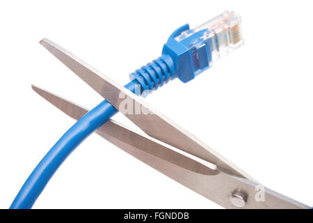 cutting a blue network cable with scissors on white Stock Photo