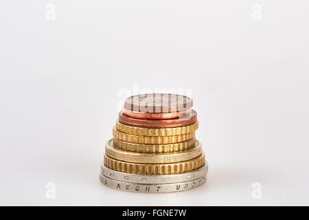 Stack of piled euro coins isolated on white background Stock Photo