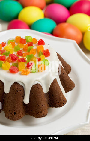 Easter cake and multi-colored Easter eggs. Selective focus. Stock Photo