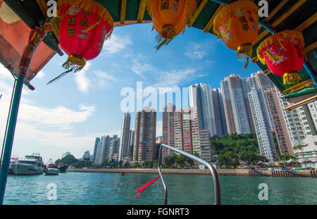 Hong Kong China Aberdeen from boat in water of reclaimed land with sktscraper condos Stock Photo