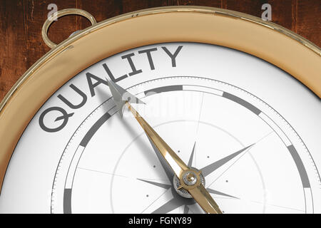 Composite image of compass pointing to quality Stock Photo
