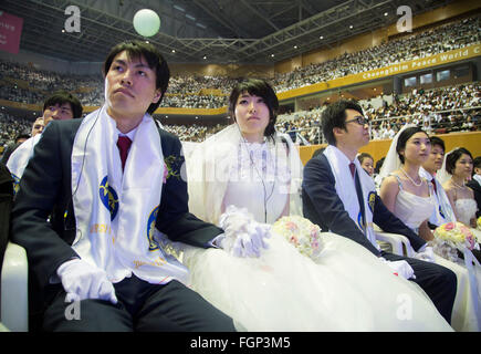 Unification Church's mass wedding, Feb 20, 2016 : Newlyweds participate in a mass wedding ceremony of the Unification Church at the Cheong Shim Peace World Center in Gapyeong, about 60 km (37 miles) east of Seoul, South Korea.The church said about 3,000 couples from more than 60 countries participated in the mass wedding in Gapyeong and other 12,000 couples attended in the wedding ceremony through live-streamed broadcast, which was organized by Han Hak-Ja, widow of the late Rev. Moon Sun-Myung, founder of the Unification Church. © Lee Jae-Won/AFLO/Alamy Live News Stock Photo