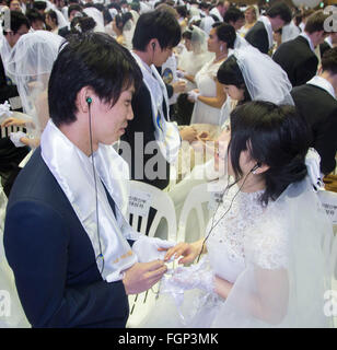 Unification Church's mass wedding, Feb 20, 2016 : Newlyweds participate in a mass wedding ceremony of the Unification Church at the Cheong Shim Peace World Center in Gapyeong, about 60 km (37 miles) east of Seoul, South Korea.The church said about 3,000 couples from more than 60 countries participated in the mass wedding in Gapyeong and other 12,000 couples attended in the wedding ceremony through live-streamed broadcast, which was organized by Han Hak-Ja, widow of the late Rev. Moon Sun-Myung, founder of the Unification Church. © Lee Jae-Won/AFLO/Alamy Live News Stock Photo