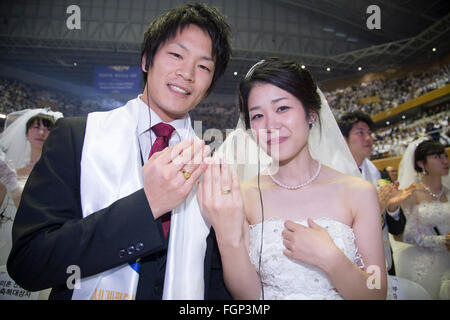 Unification Church's mass wedding, Feb 20, 2016 : Newlyweds participate in a mass wedding ceremony of the Unification Church at the Cheong Shim Peace World Center in Gapyeong, about 60 km (37 miles) east of Seoul, South Korea.The church said about 3,000 couples from more than 60 countries participated in the mass wedding in Gapyeong and other 12,000 couples attended in the wedding ceremony through live-streamed broadcast, which was organized by Han Hak-Ja, widow of the late Rev. Moon Sun-Myung, founder of the Unification Church. © Lee Jae-Won/AFLO/Alamy Live News Stock Photo