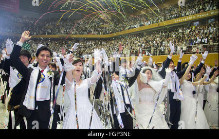 Unification Church's mass wedding, Feb 20, 2016 : Newlyweds participate in a mass wedding ceremony of the Unification Church at the Cheong Shim Peace World Center in Gapyeong, about 60 km (37 miles) east of Seoul, South Korea.The church said about 3,000 couples from more than 60 countries participated in the mass wedding in Gapyeong and other 12,000 couples attended in the wedding ceremony through live-streamed broadcast, which was organized by Han Hak-Ja, widow of the late Rev. Moon Sun-Myung, founder of the Unification Church. © Lee Jae-Won/AFLO/Alamy Live News Stock Photo