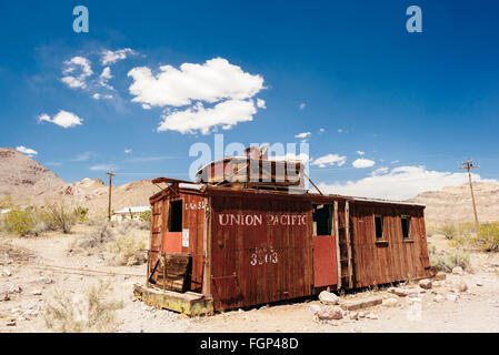 An abandoned railroad car in the desert ghost town of Rhyolite, Nevada Stock Photo