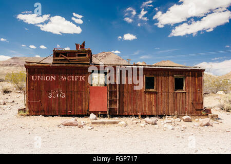 An abandoned railroad car in the desert ghost town of Rhyolite, Nevada Stock Photo
