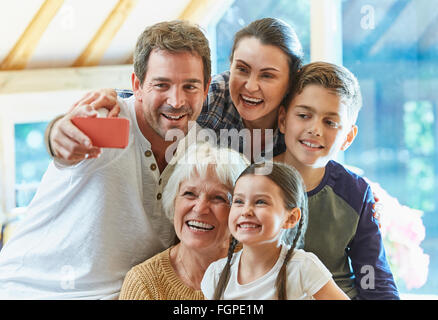 Multi-generation family taking selfie Stock Photo
